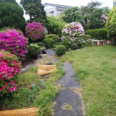 Yokoso Ryokan Беппу Экстерьер фото